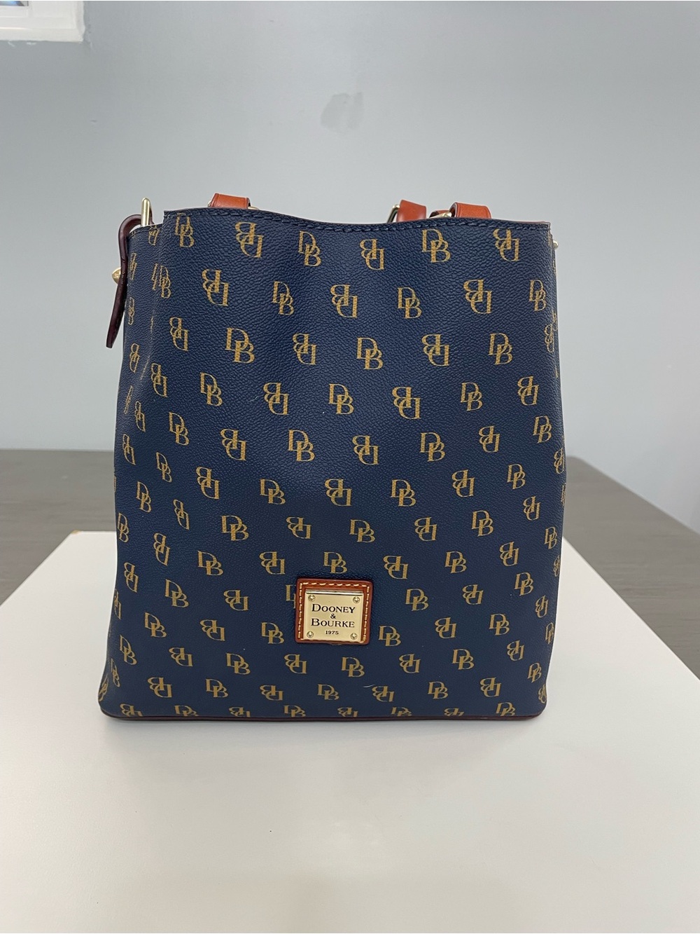 Dooney & Bourke Navy Logo Messenger Bag with Tan Accents